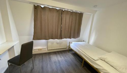 Quadruple Room with Shared Bathroom