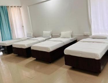 Single Bed in Dormitory Room