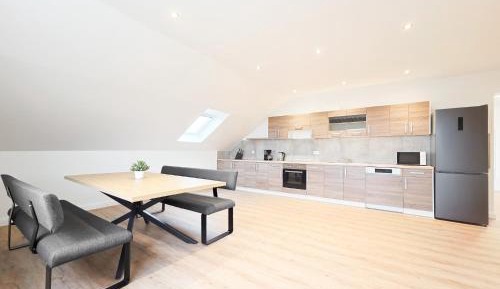 Four-Bedroom Apartment with Balcony 