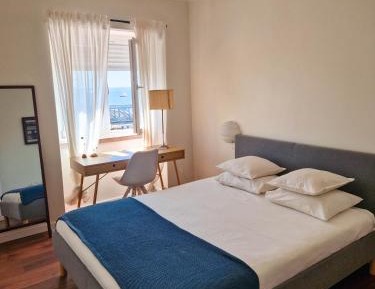 Two-Bedroom Apartment with Balcony and Sea View