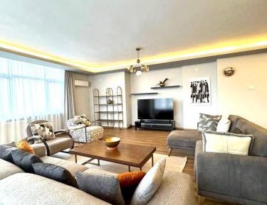 Three-Bedroom Apartment with Balcony
