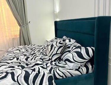 Deluxe Two-Bedroom Apartment with Garden View