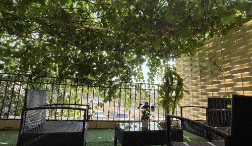 Four-Bedroom Apartment with Balcony 