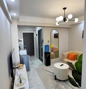 One-Bedroom Apartment with Balcony and City View