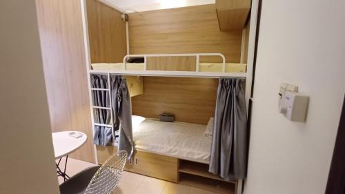 Single Bed in Dormitory Room