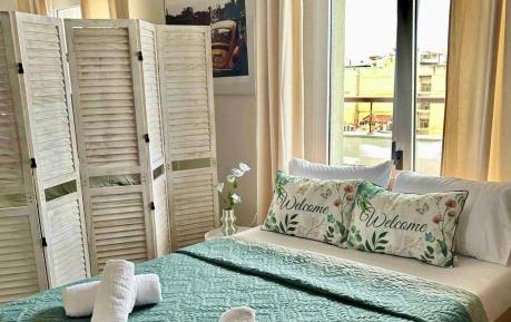 One-Bedroom Apartment with Balcony and City View