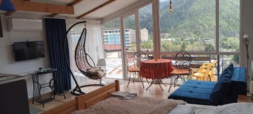 One-Bedroom Apartment with Balcony and Mountain View  