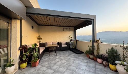 One-Bedroom Apartment with Balcony and Mountain View  