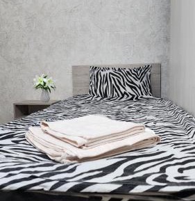 Single Bed in Dormitory Room