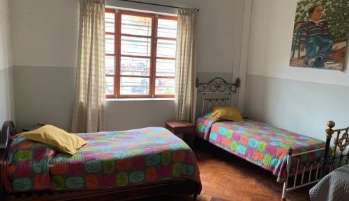 Basic Triple Room with Shared Bathroom