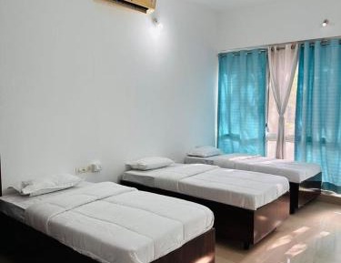 Single Bed in Dormitory Room