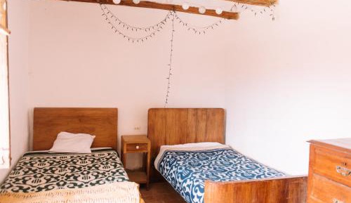 Single Bed in Dormitory Room