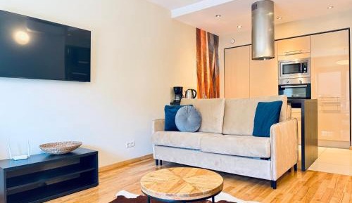 One-Bedroom Apartment with Balcony and City View