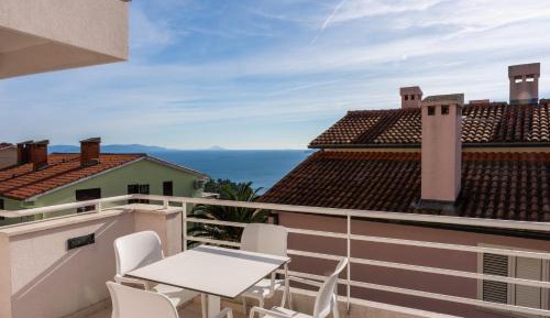 One-Bedroom Apartment with Balcony and Sea View