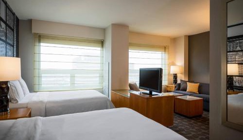 Studio Suite with Two Double Beds and Sofa Bed