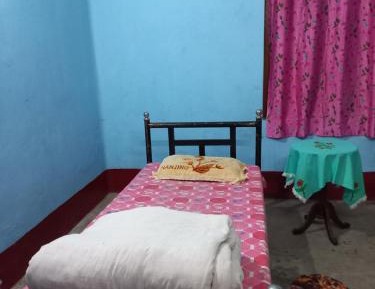 Single Bed in Dormitory Room