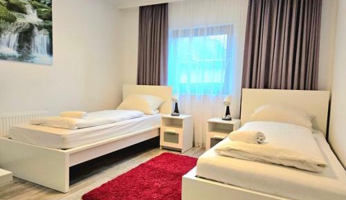 Four-Bedroom Apartment with Balcony 