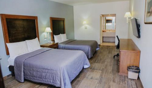 Double Room with Two double beds and Breakfast for two