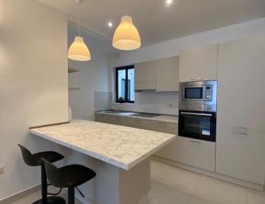 Two-Bedroom Apartment with Balcony