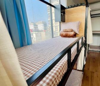 Single Bed in Dormitory Room