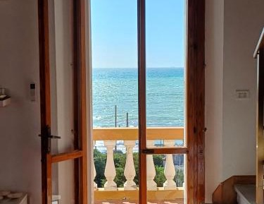 One-Bedroom Apartment with Balcony and Sea View