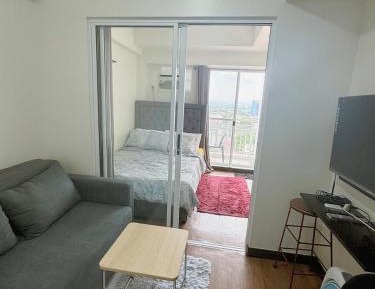 One-Bedroom Apartment with Balcony and City View