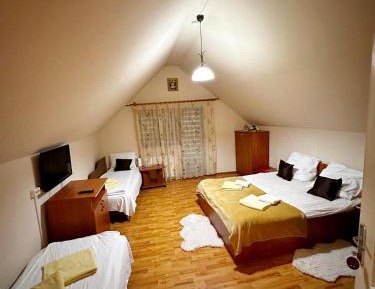 Quadruple Room with Private Bathroom