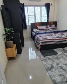 Deluxe Room (2 Adults + 1 Child)