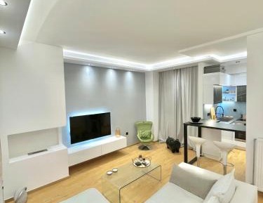 One-Bedroom Apartment with Balcony and City View