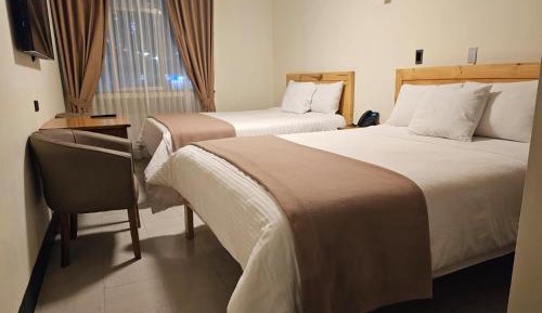 Quadruple Room with Private Bathroom