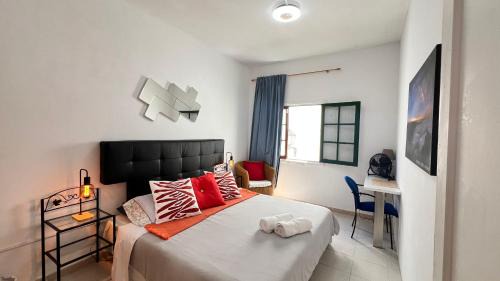 Queen Room with Shared Bathroom