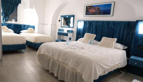 Quadruple Room with Private Bathroom