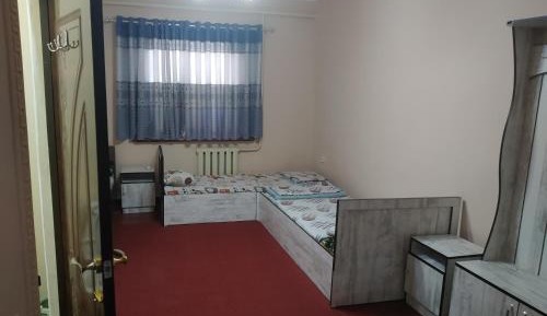 Single Bed in Dormitory Room