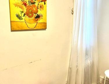 Queen Room with Shared Bathroom