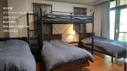 Quadruple Room with Shared Bathroom