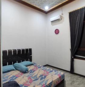 Deluxe Room (2 Adults + 1 Child)
