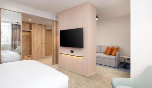 Junior King Suite with Sofa Bed and City View