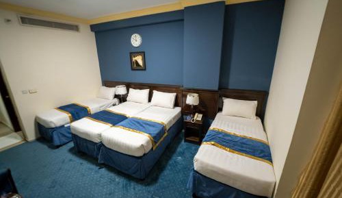 Quadruple Room with Private Bathroom