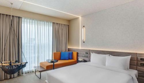Premier King Room with Complimentary IMFL from 6:00 pm to 8 pm at Barcode and Shared Airport Transfer