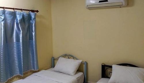 Standard Twin Room with Shared Bathroom