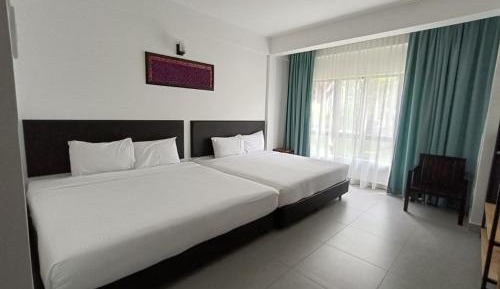 Deluxe Quad Garden View