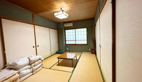 Japanese-Style Family Room with Shared Bathroom