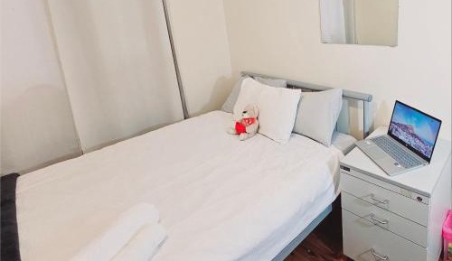 Queen Room with Shared Bathroom