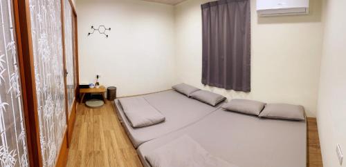 Quadruple Room with Shared Bathroom
