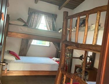 Economy Quadruple Room with Shared Bathroom