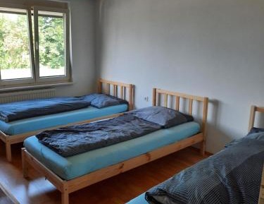 Basic Triple Room with Shared Bathroom