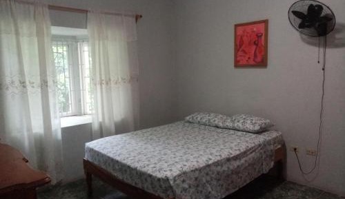 Queen Room with Shared Bathroom