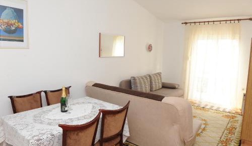 One-Bedroom Apartment with Balcony and Sea View