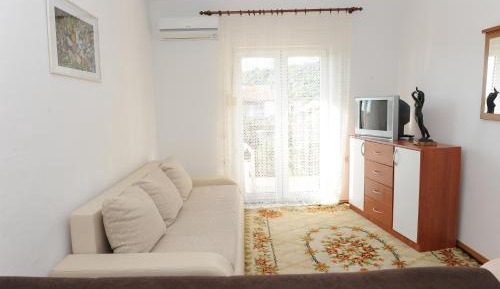 One-Bedroom Apartment with Balcony and Sea View