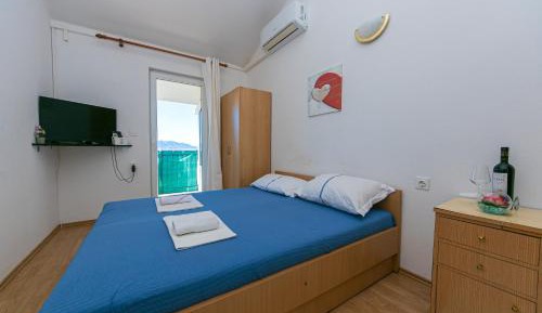 One-Bedroom Apartment with Balcony and Sea View